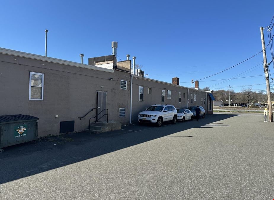 711 Broadway Industrial Trade Building with In-Place Dry Cleaner Income