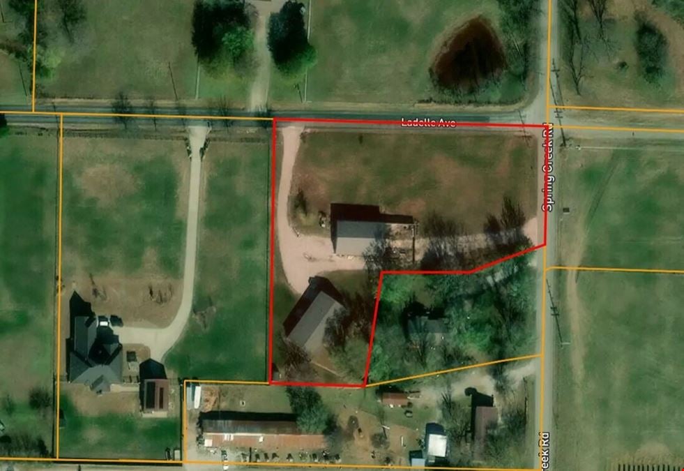 1.97 ACRES IN LOWELL, AR WITH SHOP AND HOME