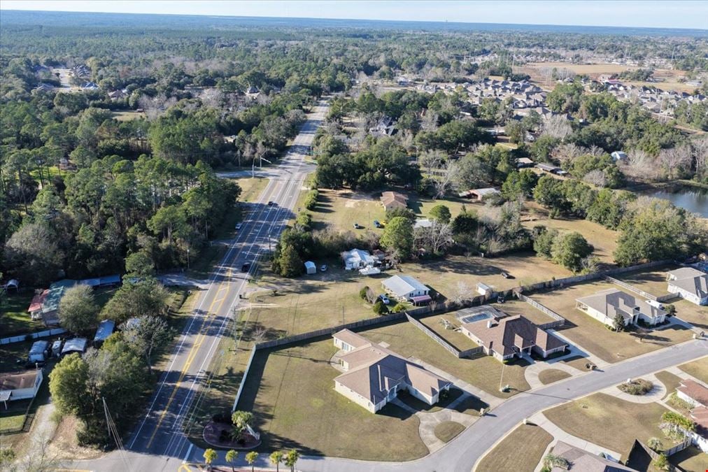 7998 Mobile Hwy | Signalized Hard Corner For Sale