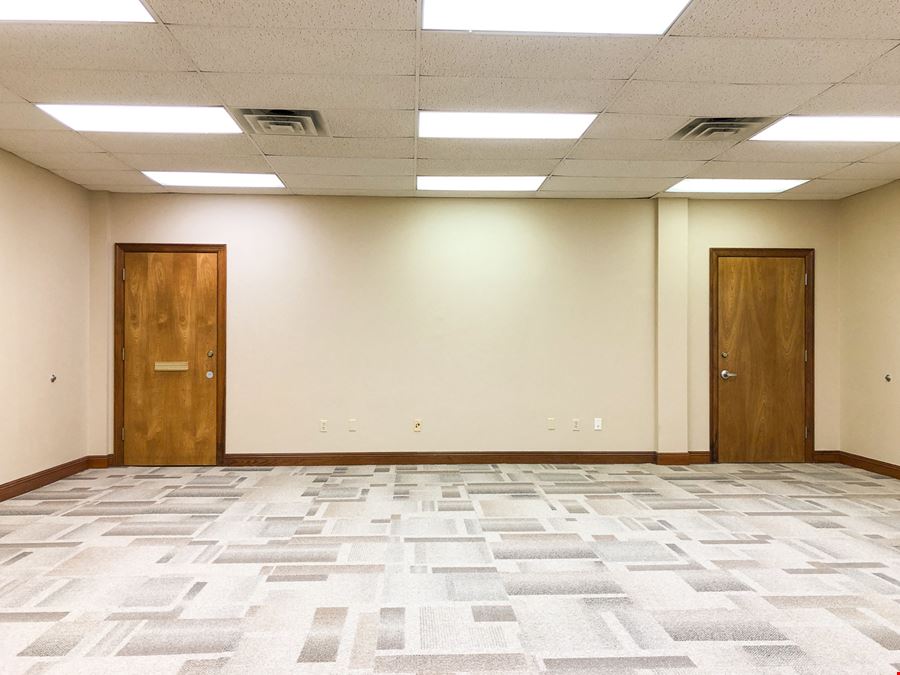 New Price: Gras Town Plaza - Office Building & Parking Lot in Downtown
