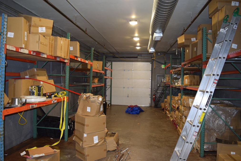 1,500 SF free-standing office/warehouse with small yard.