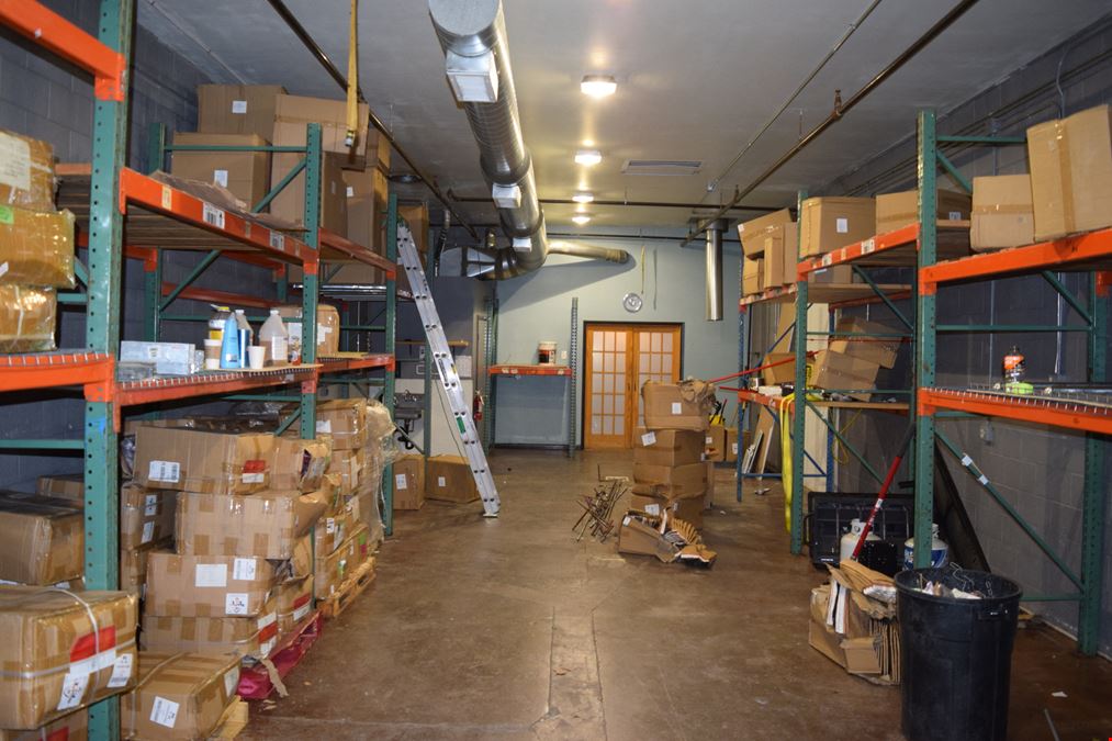 1,500 SF free-standing office/warehouse with small yard.