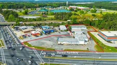 Preview of Retail space for Sale at 5158 Jonesboro Rd & 1270 Forest Pkwy