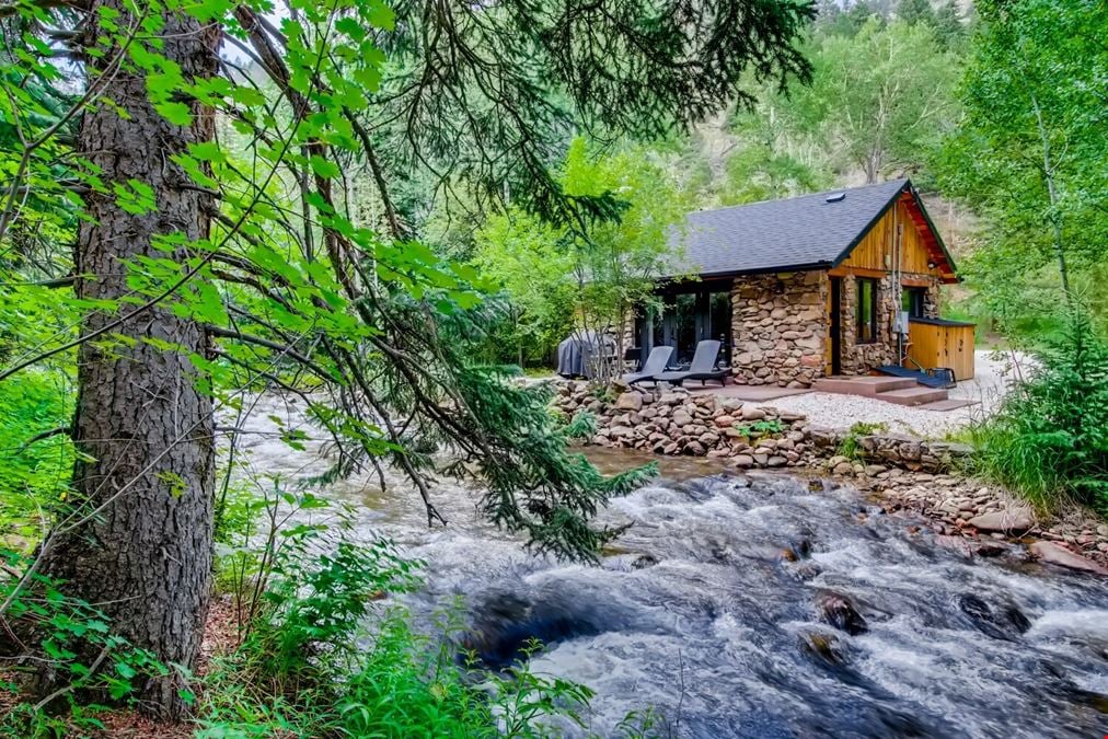 Water & Stone Cabins | 14-Keys | C-3 Zoning | Live Creek Frontage | 6.7 CAP