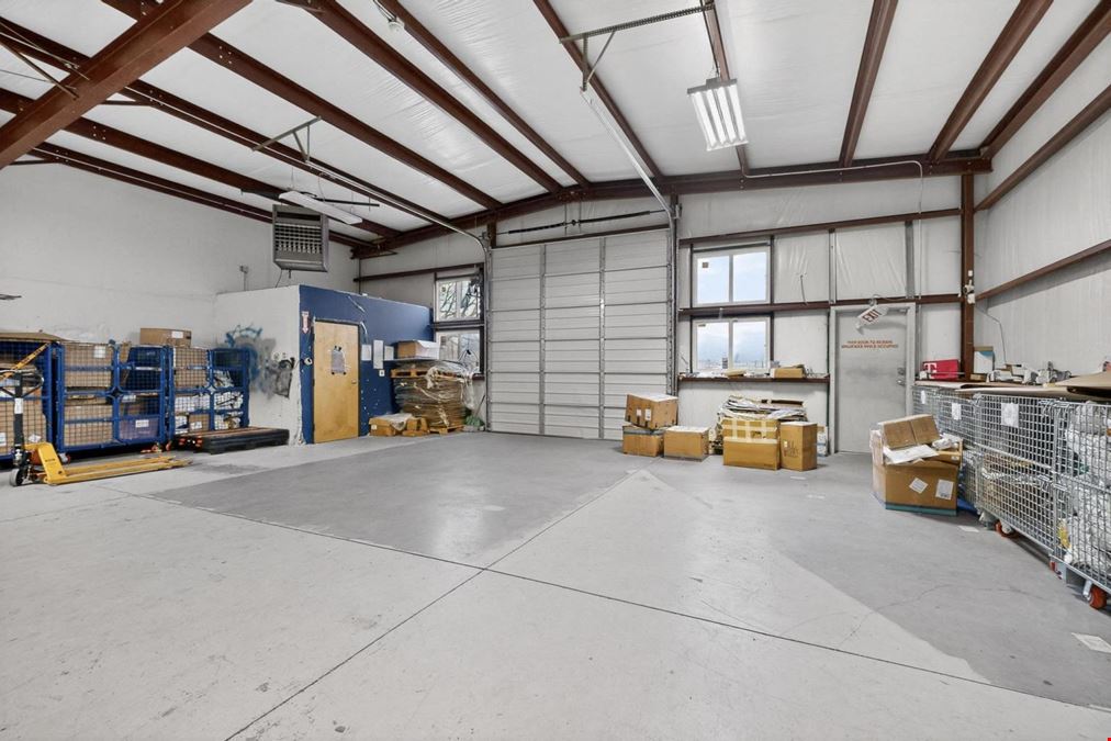 RARE WAREHOUSE WITH GATED & PAVED YARD