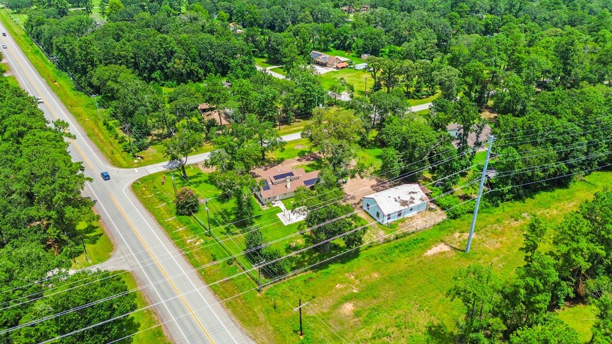 Unrestricted Versatile 1-Acre Commercial Property in Conroe –  Industrial Storage Shed & Carport & home
