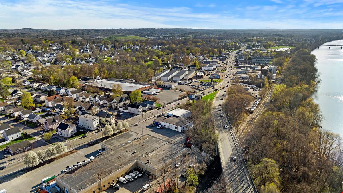 High Visibility Automotive Showroom/Warehouse Property | Lowell, Massachusetts