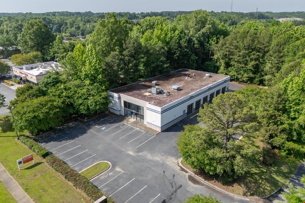 REIT Sale | Former NTB | 54K VPD | Charlotte MSA | $125K HH Income