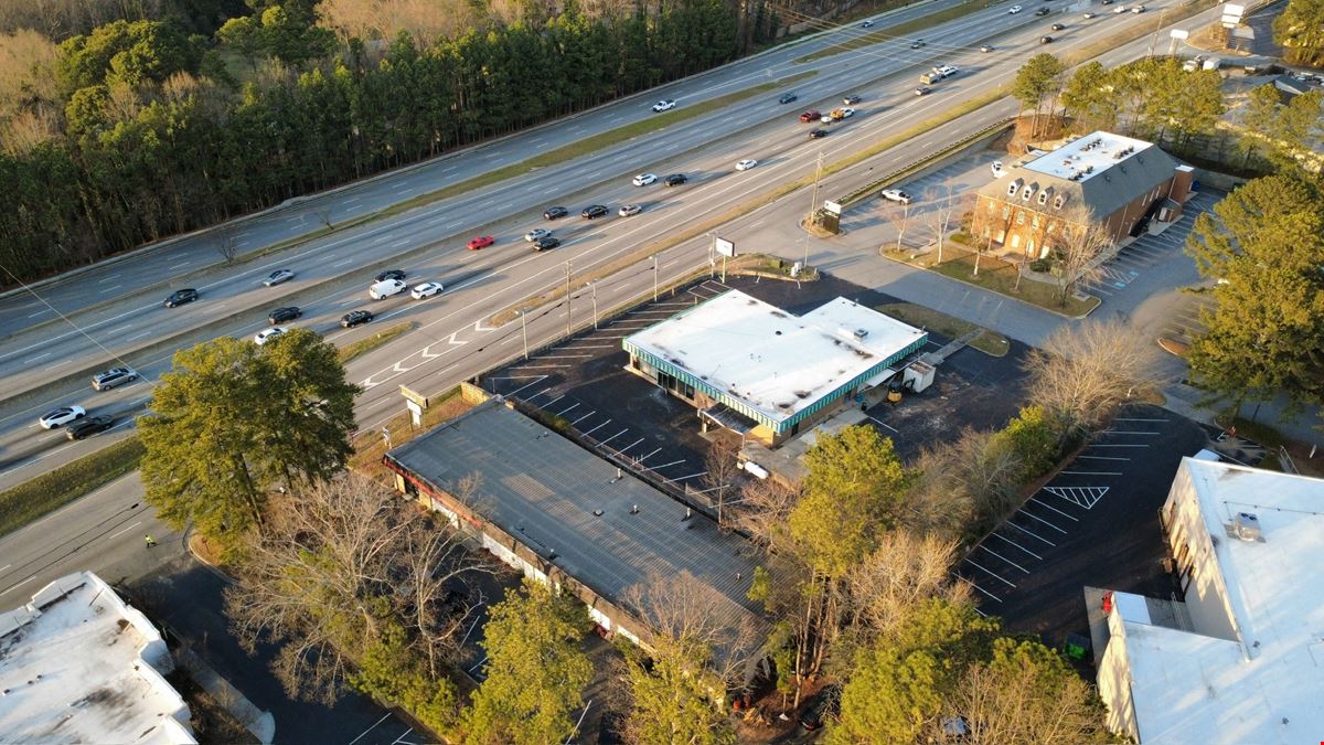 Freestanding Warehouse Building with Retail Exposure | ±7,500 SF | For Sale