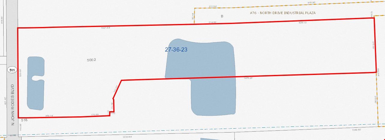 Price Reduced: Income Property + Additional Industrial Land