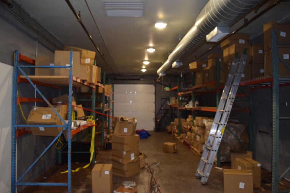 1,500 SF free-standing office/warehouse with small yard.