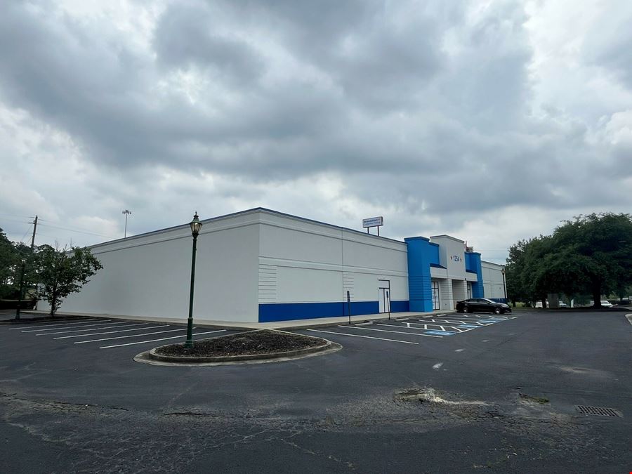 BrandsMart Warehouse (Vacant) & Billboard