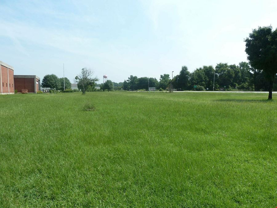 Former Talon Zipper Manufacturing/Warehouse - 105,251 SF - Adjacent to Runway with Potential IOS Land - 20 +/- Acres - Opportunity Zone