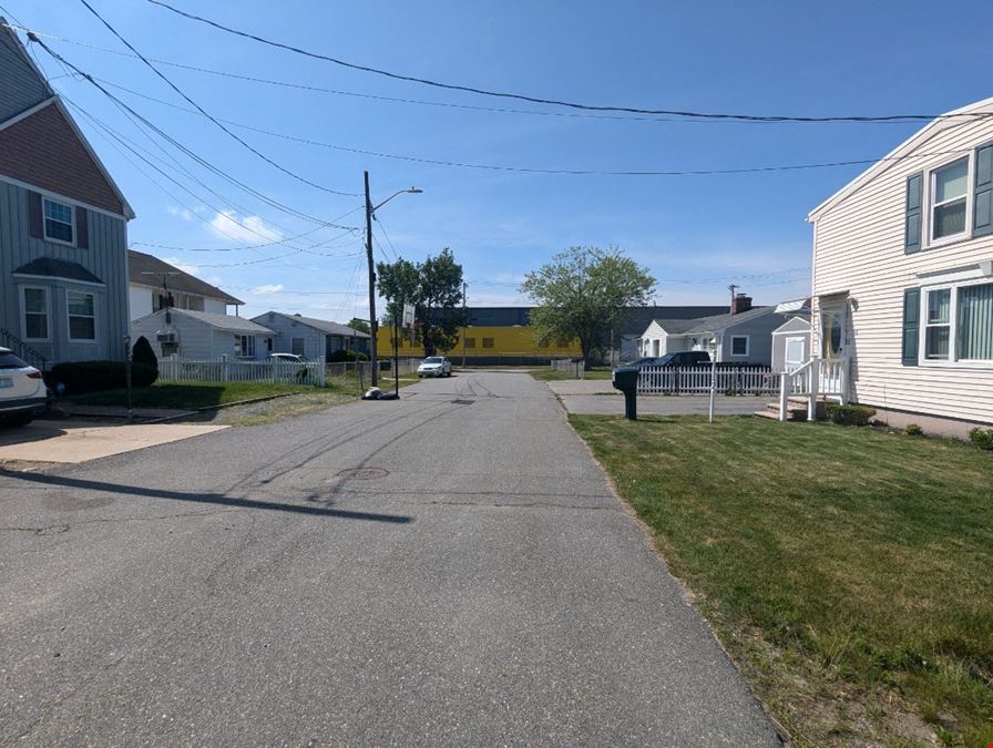 Versatile Industrial Property with Extra Lot – 21 Pommenville St, Pawtucket, RI  02861 & lot 927 Campbell St 