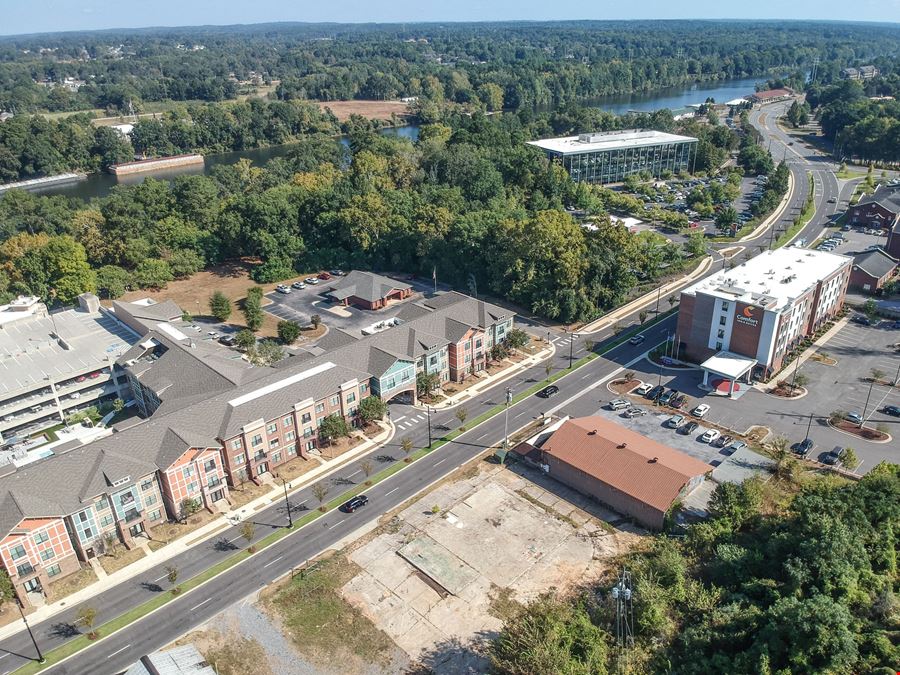 Prime Riverfront District Land + Building