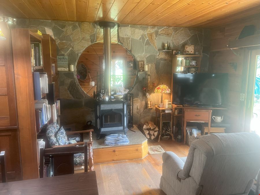 Logs, Cabins & Land