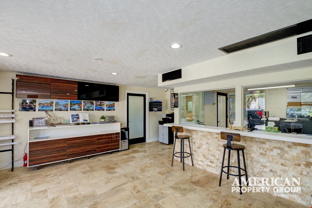 Corner Lot Industrial Property with Showroom, Office, and Yard