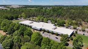 Office Building and Adjoining Land Available For Sale