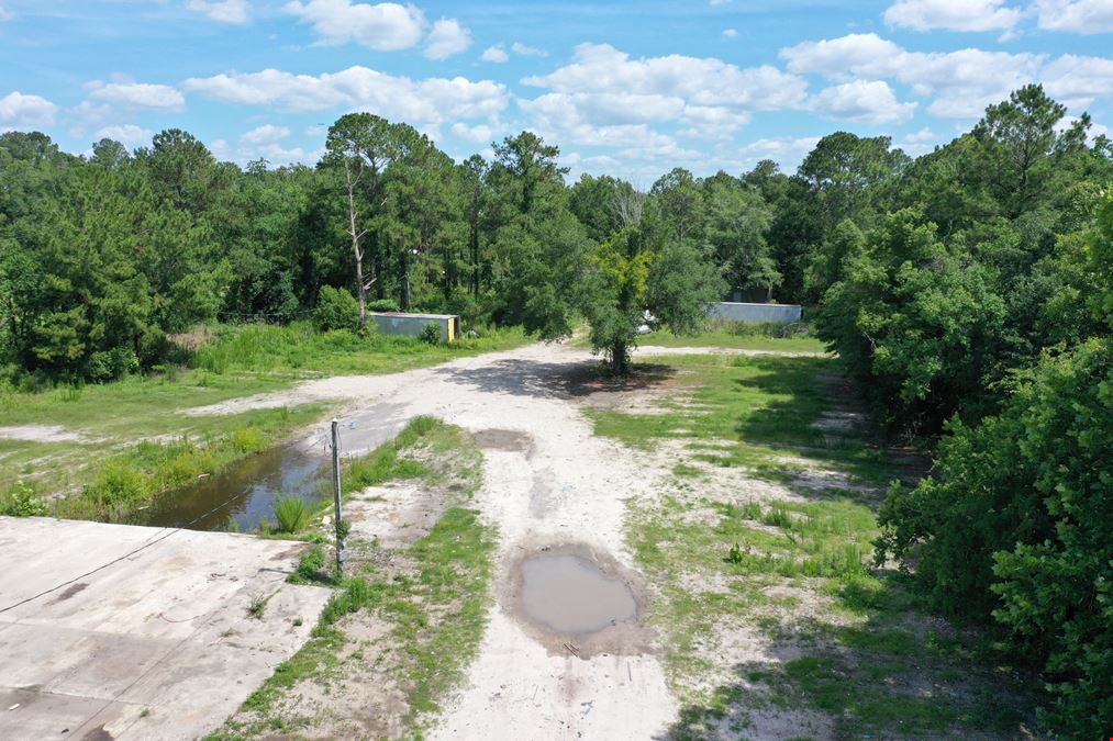 5.55± Acres | Dual Frontage | Existing Improvements