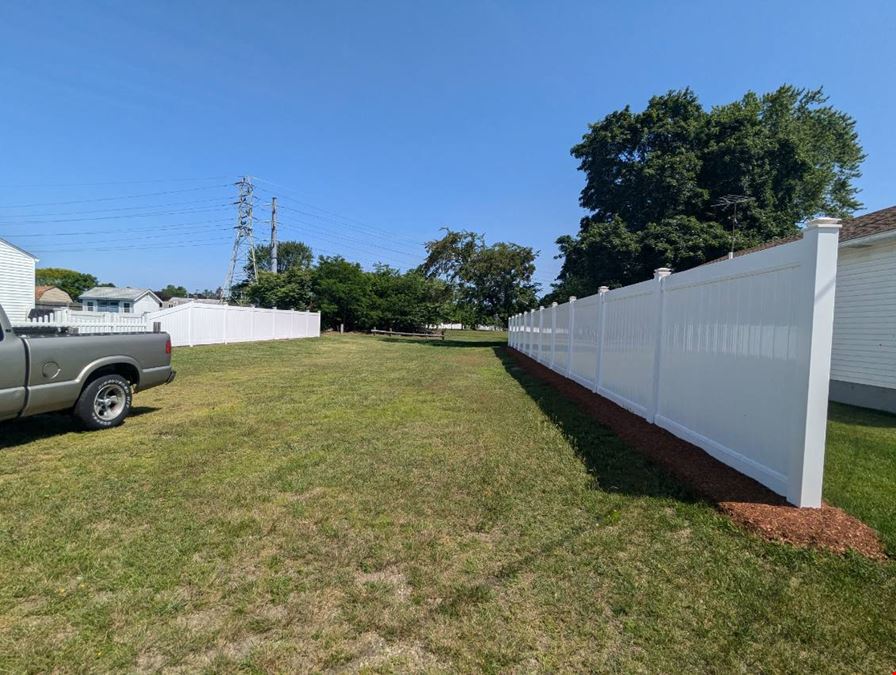 Versatile Industrial Property with Extra Lot – 21 Pommenville St, Pawtucket, RI  02861 & lot 927 Campbell St 