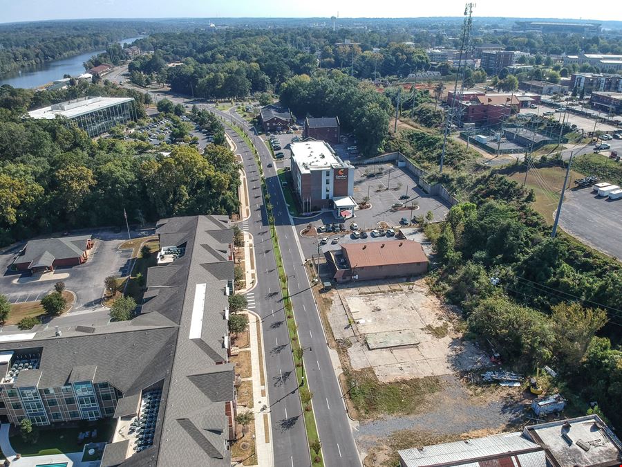 Prime Riverfront District Land + Building