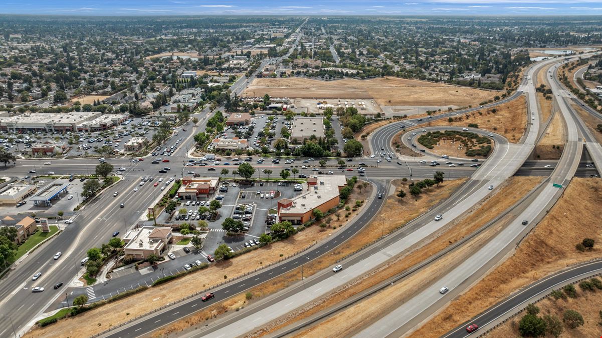 Tuscan Plaza Shopping Center: Prime Retail End Cap & Shop Space