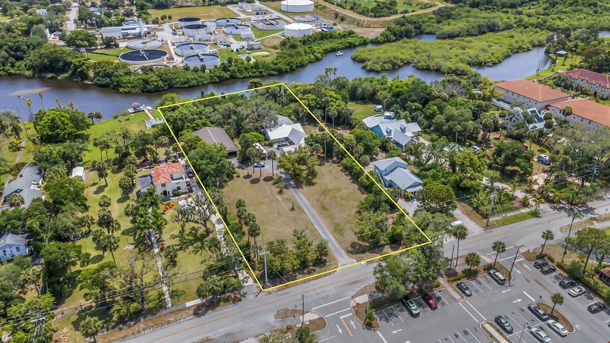 THE 2.08 ACRES OF MULTI-FAMILY LAND IMPROVED WITH SINGLE-FAMILY HOMES