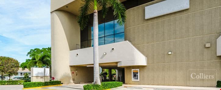Boutique owner-user office building with oversized balconies and garage parking in North Palm Beach, FL