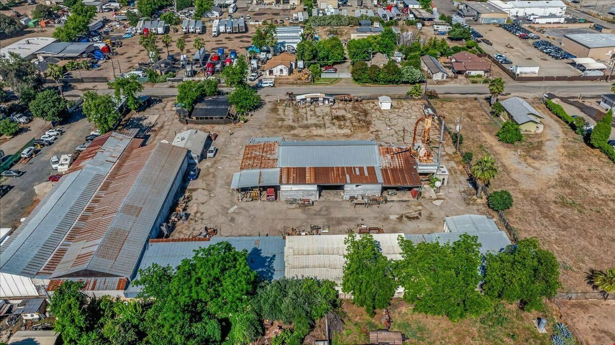Open Industrial Buildings on 2.14 AC Fenced Land