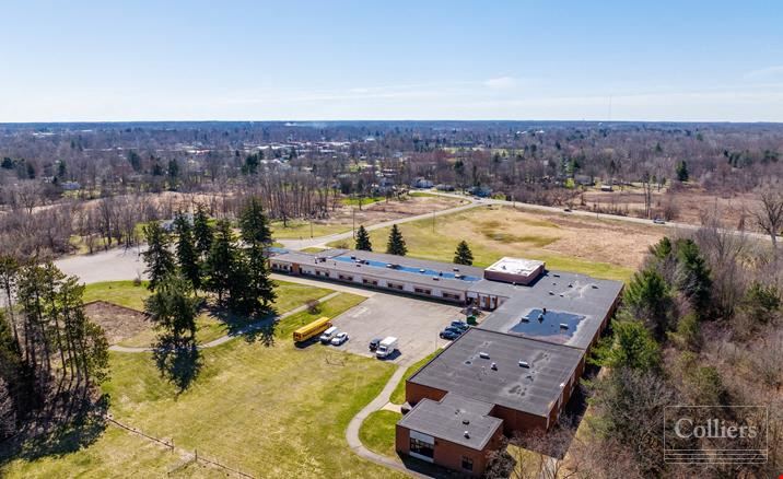 Freestanding Former Charter School | Ideal for Redevelopment/Backfill | 15+ Acres | Eaton Rapids, MI