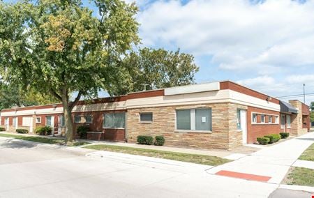 Preview of Office space for Sale at 18101-18111 E. Warren Ave.