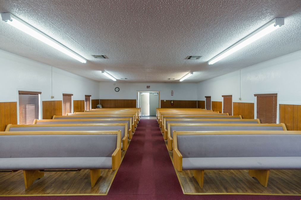 Church building with Modular home and 2 Sheds perfect for storage!