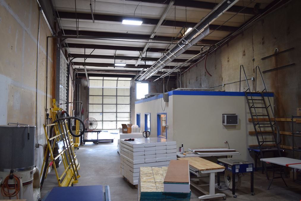 2,000 SF warehouse with dock high loading (drive in access potential)