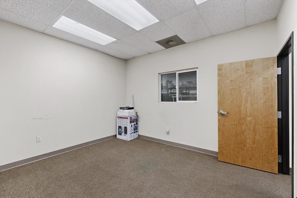 RARE WAREHOUSE WITH GATED & PAVED YARD