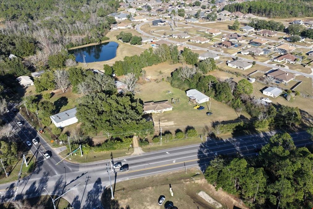 7998 Mobile Hwy | Signalized Hard Corner For Sale
