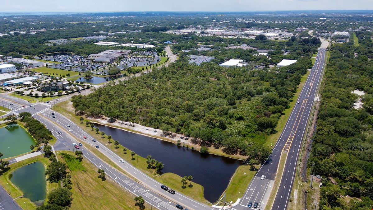 23±AC Development Site | Adjacent to Orlando-Melbourne Int'l Airport | Retail/Office/Hotel/Motel/Possible Multi-Family