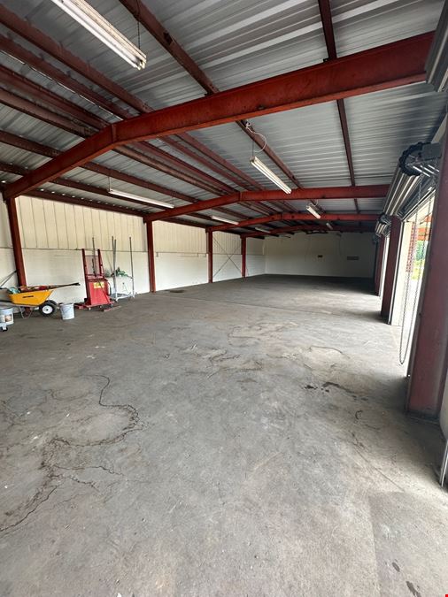 6.68 acres of Industrial Outdoor Storage (IOS) w/ Warehouse
