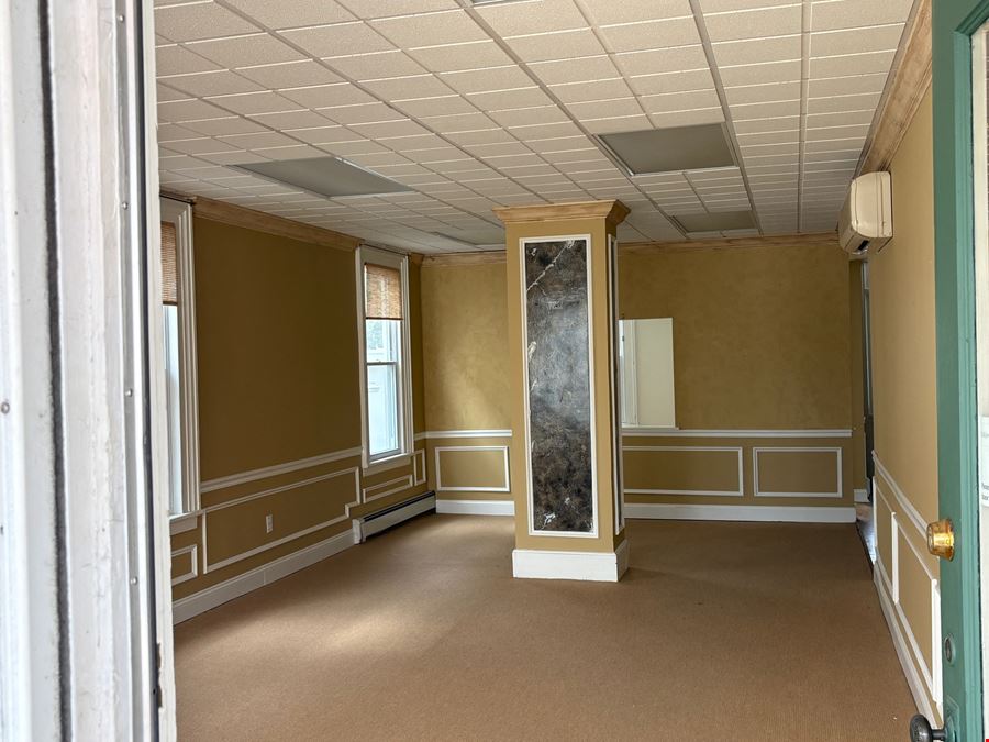 For Sale: Mixed-Use Retail/Office + 4 Apartments