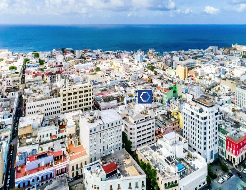 Redevelopment Opportunity: 15 Apartments and 4 Retail Locales in 8-Story Building in Old San Juan with Panoramic Views - For Sale