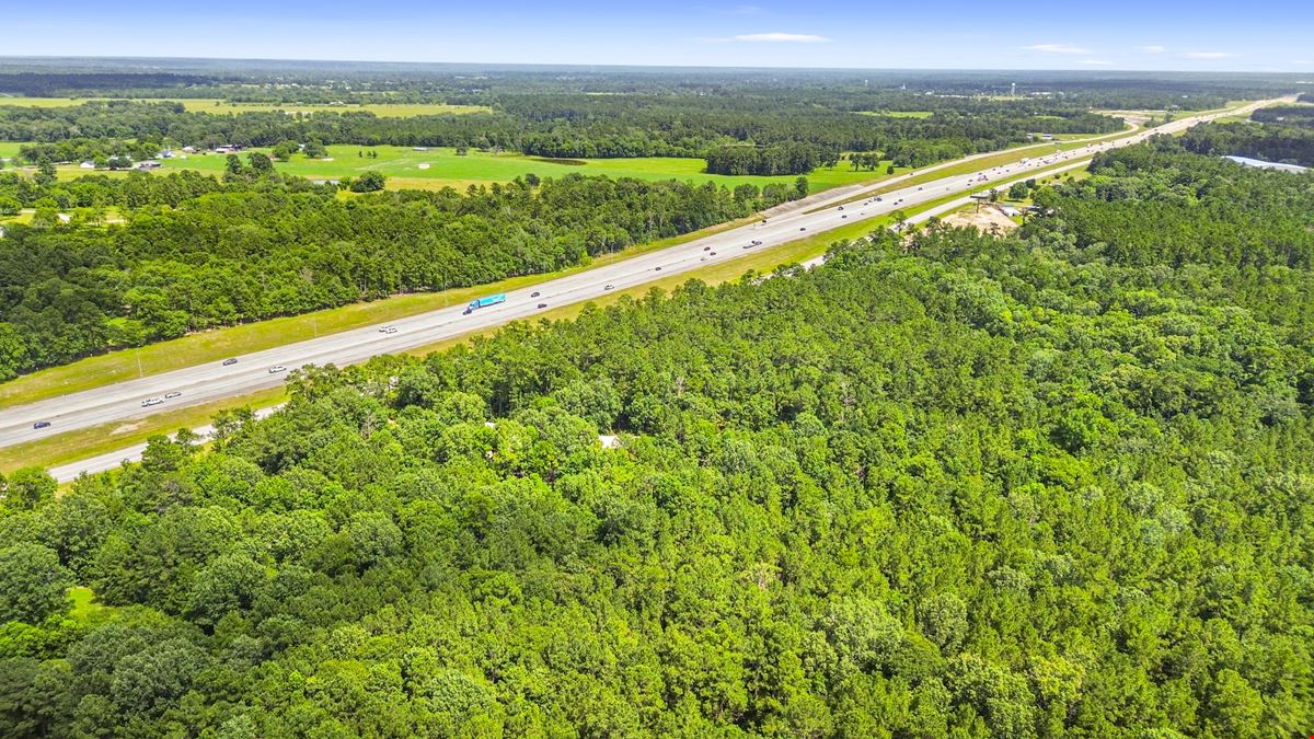 Prime Interstate-Frontage Commercial Tract – ±8.8 Acres with 3 Income Producing Building