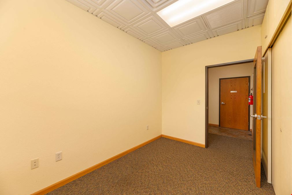 Turnkey Professional Office Condo in Premier Business Sector