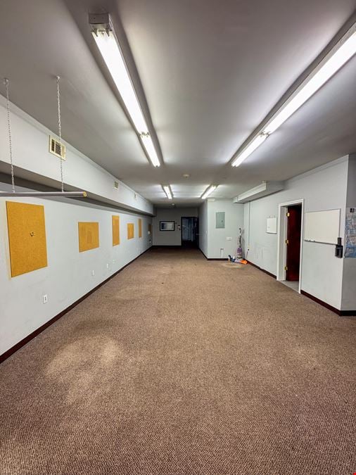 1,500 SF | 409 Broadway | Retail Space with Basement & Glass Frontage for Lease