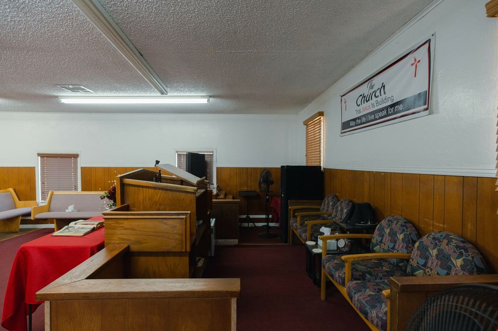 Church building with Modular home and 2 Sheds perfect for storage!