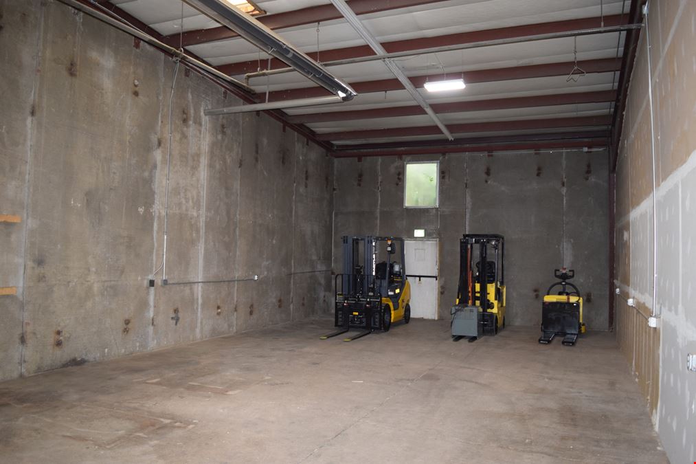 2,000 SF warehouse with dock high loading (drive in access potential)