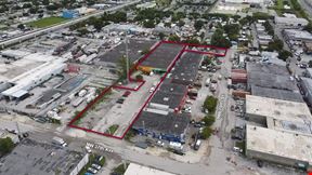 1.72 Acre Total Lot with Existing +/- 26,304 SF Multi-Tenant Warehouse