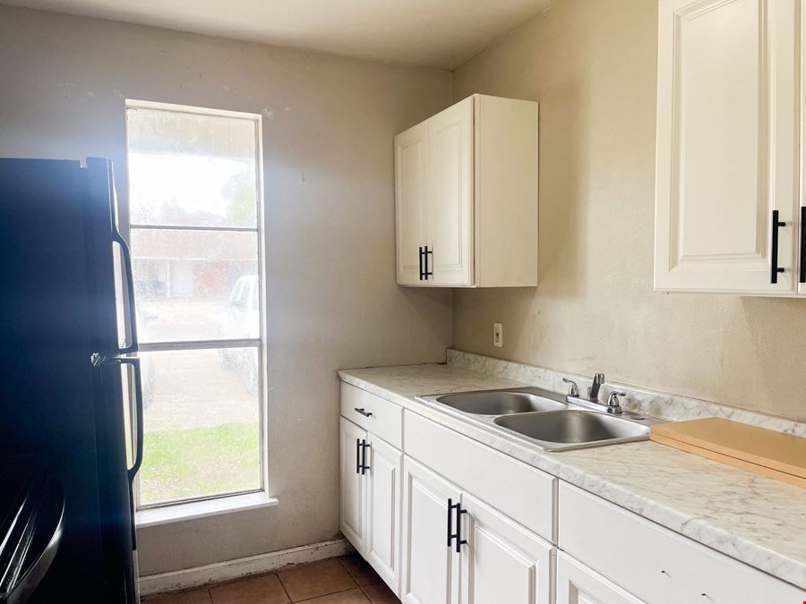 Renovated, Cash-Flowing Duplex near Upcoming Developments
