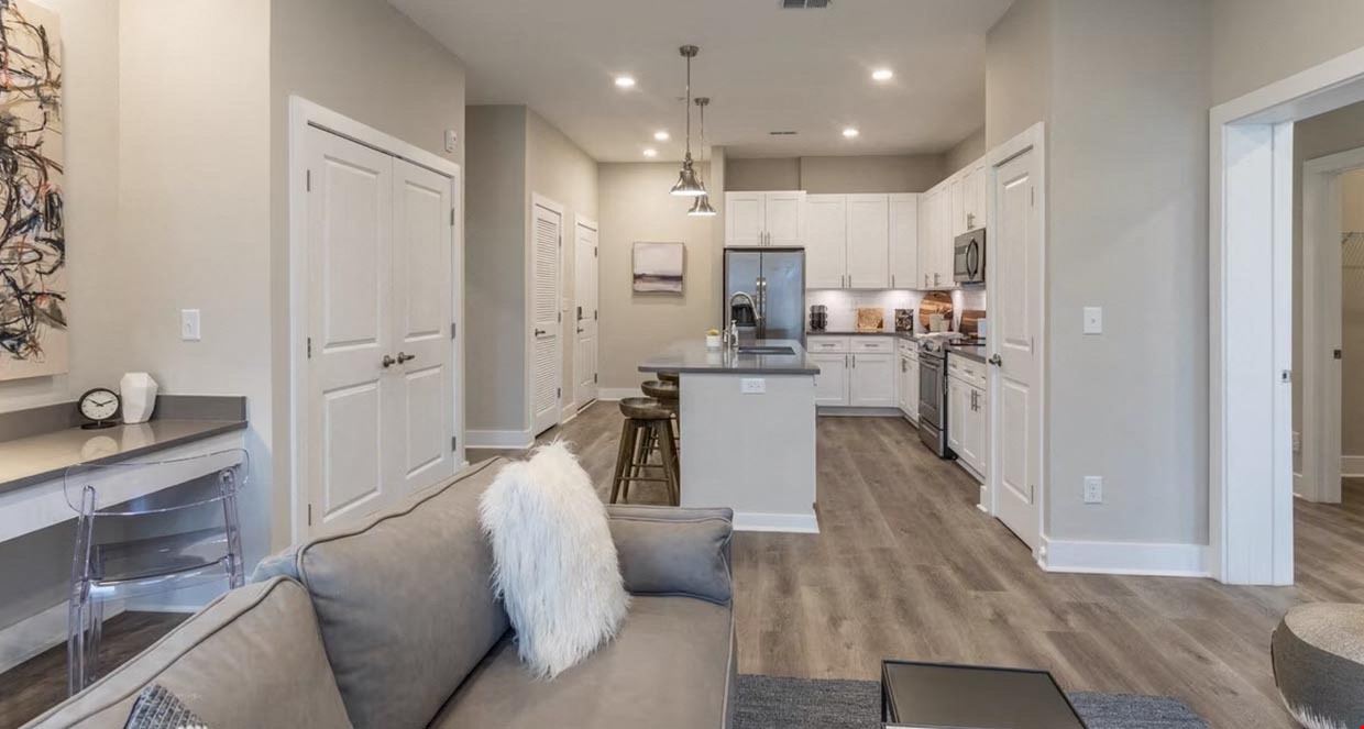 100% of the Limited Liability Company Membership Interests in the Entities that Own the Ansley Park, NC Apartment Complex