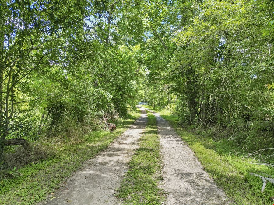 13.77 acres minutes from HWY 59