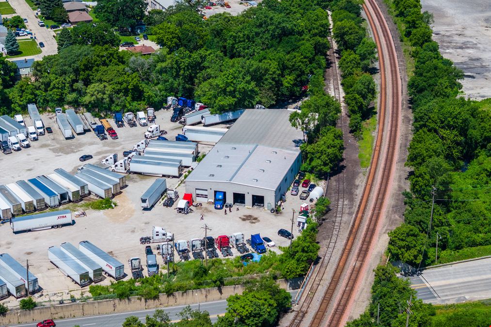 Industrial Facility with Office Space & Fleet Storage & 11.8± AC Dev. Site