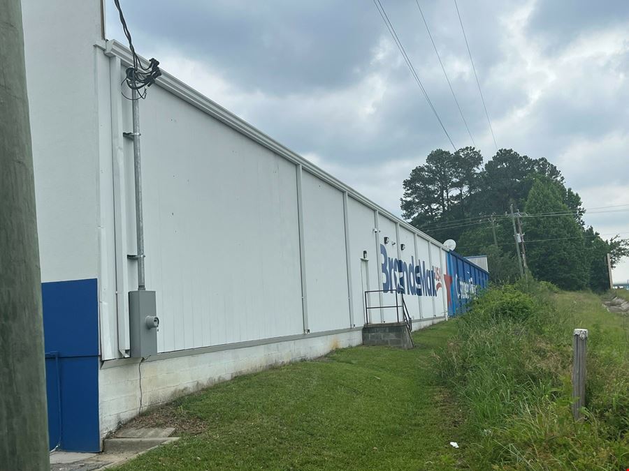 BrandsMart Warehouse (Vacant) & Billboard